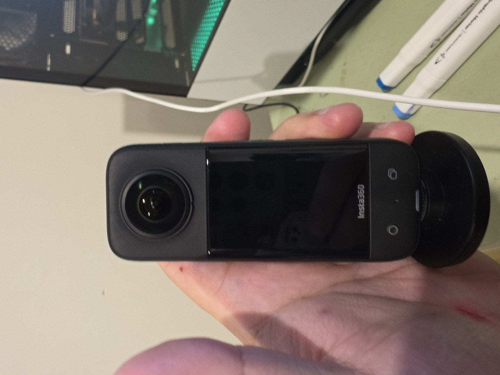 Insta360 X4 (or similar X‑series 360 camera)